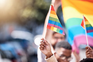 Image showing Closeup, hands and LGBTQ flag with people, protest and community with human right, gay and lesbian. Zoom, queer and group with rainbow symbol, sexuality and bisexual with freedom, pride and happiness