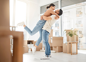 Image showing Love, moving and hug with couple in new home for celebration, property and relocation. Excited, happy and real estate with man and woman in living room apartment for investment, rent and homeowner