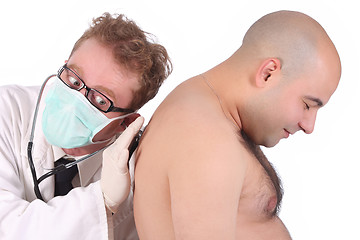 Image showing funny doctor checking a patient 