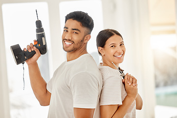 Image showing Couple, working and portrait with construction tools, maintenance equipment and house decoration or renovation. People, back together and smile for home building, interior design or diy project