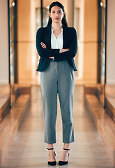 Image showing Woman, professional and serious in portrait with arm at the office as leader in entrepreneurship. Female expert, determined and manager at business with arms at an agency for career with confidence.