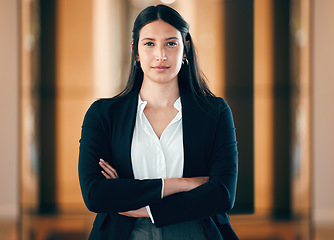 Image showing Business, woman and arms in a serious portrait at the office for career as entrepreneur in company. Female professional, focus and face with arm as leader in a workplace for job with employee.