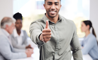 Image showing Portrait, hand and a business man thumbs up in the boardroom with his team planning in the background. Leadership, workshop and motivation with a happy male employee showing support in the office