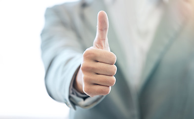 Image showing Businessman, hand and thumbs up for approval, success or corporate winning at the office. Hands of man with thumb emoji, yes sign or like for achievement, agreement or thank you at the workplace