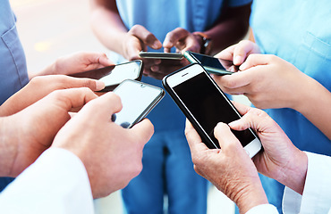 Image showing Phone, team hands and doctors for contact us, communication and workflow or teamwork online. Medical, healthcare and circle of surgeon, nurses or group of people typing on smartphone for web 3.0 chat