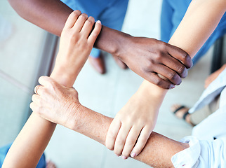 Image showing Circle, connection and teamwork of doctors hands in healthcare power, group support and team synergy above. Integration, cross and nurses, medical people or diversity surgeon together in cooperation