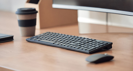 Image showing Space, office and desk with keyboard in a closeup for working with technology for a career. Empty, table and tech with mouse at work with monitor at a corporate company for job with equipment.