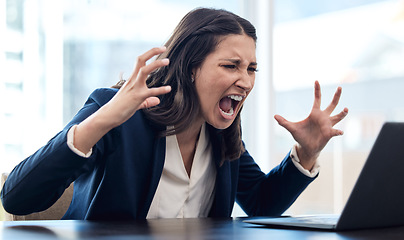 Image showing Business, woman and angry is shouting at computer with a problem or frustrated at company with entrepreneur. Female professional, anger and laptop with screaming, stress at office with online work.