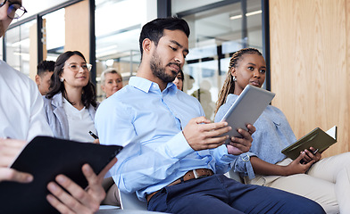 Image showing Staff, group and business people in a conference room, audience and seminar for corporate training, listening and diversity. Team, man and woman with notebook, tablet and workshop for development