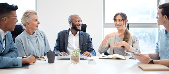 Image showing Meeting, planning and collaboration with a business woman talking to her team in the boardroom at work. Teamwork, strategy and brainstorming with a female employee in the office to explain her vision