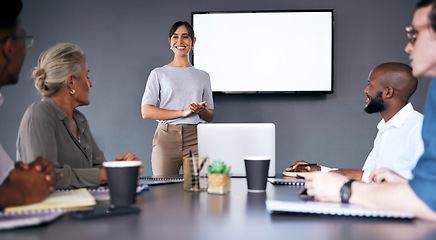 Image showing Business woman, meeting and presentation with mockup screen for team strategy or project management at office. Female person, coach or mentor with smile in staff training on mock up at the workplace