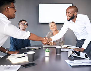 Image showing Business people, handshake and meeting for partnership, deal or b2b agreement together at office. Businessman shaking hands for teamwork, collaboration or welcome in hiring or recruiting at workplace