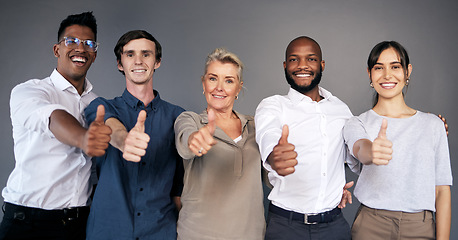Image showing Group portrait, business people and thumbs up by wall with teamwork, smile or diversity at insurance agency. Men, women and hand emoji with sign for team building, solidarity or agreement in office