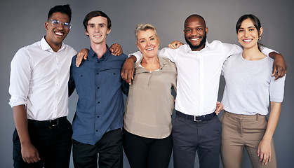 Image showing Group portrait, business people and hug by wall with teamwork, smile or diversity at insurance agency. Men, women and together with happiness for team building, solidarity or collaboration in office