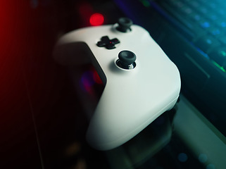 Image showing Closeup of video game controller, technology to play games and online streaming with esports and gaming gadget. Gamer tools, tech on desk and live stream with digital world and streamer joystick