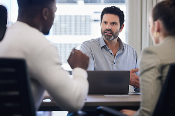 Image showing Meeting, management and a serious man in business talking to staff in his office at work for planning. Laptop, discipline and discussion with a male manager addressing a team in a corporate workplace