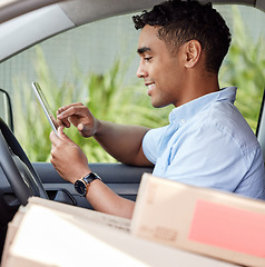 Image showing Courier, driver in car with tablet, smile and boxes, checking location, order or online map for logistics. Service, happy delivery man in van with package or box, online for digital logistic schedule