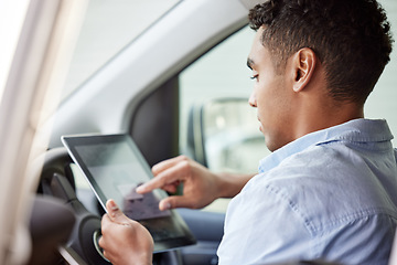 Image showing Tablet, navigation and a man driving a car while searching online for directions to a location as a driver. Map, technology and app with a young male sitting in a vehicle for transport or travel