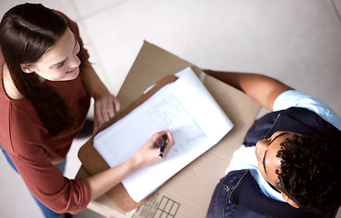 Image showing Top view, courier and woman with a delivery, signature and shipping with products, ecommerce and box. Female person, customer or employee with a package, parcel or signing with document and clipboard