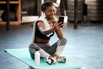 Image showing Fitness, woman and exercise selfie at gym for social media platform or app. Influencer, training and health blog with black person taking workout picture for weight loss and wellness motivation