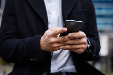 Image showing Business man, phone and hands typing outdoor for communication, social media or chat. Closeup of male entrepreneur person with smartphone in city for network, internet connection or mobile travel app