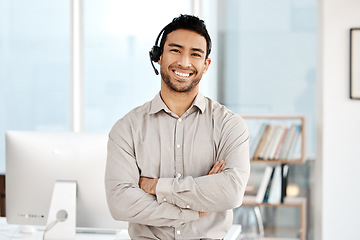 Image showing Happy asian man, call center and portrait with headphones in customer service or telemarketing at office. Confident businessman consultant agent smile with arms crossed for online advice at workplace