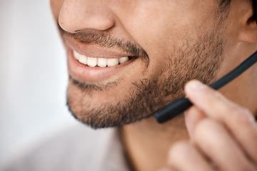 Image showing Businessman, call center and mouth with mic for customer service, support or telemarketing at the office. Closeup of friendly happy man consultant or agent lips smiling with headphones in contact us