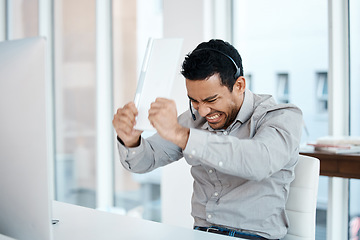Image showing Angry, frustrated and consultant breaking keyboard and fail or computer glitch in a call center or agency office. Stress, insurance and man employee with a problem and risk to the company or business