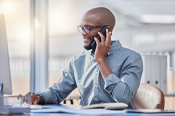 Image showing Phone call, computer and business man for online advice, technical support and IT solution in office typing. Happy african person or information technology worker on desktop, talking and mobile voip