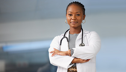 Image showing Healthcare pride, portrait and a black woman with arms crossed for clinic work and medicine career. Smile, working and a professional African doctor in a medical job at a hospital with confidence