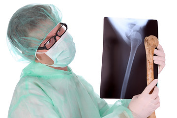 Image showing surgeon with xray and bone