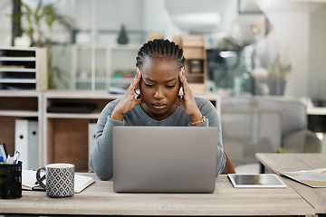 Image showing Business woman, laptop and headache in stress, burnout or depression in doubt, fail or mistake at office. Frustrated African female person or employee in anxiety or mental health problem at workplace