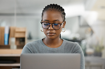 Image showing Laptop, business and black woman in office online for research, copywriting and typing email. Journalism, professional and female worker on computer writing proposal, working on report and project