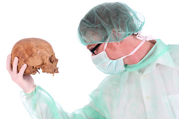 Image showing surgeon with skull