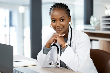 Image showing Hospital office, doctor and portrait of black woman with laptop for medical research, wellness app and internet. Healthcare, clinic and happy female worker for consulting, medicare service and help