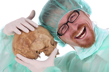 Image showing surgeon with skull