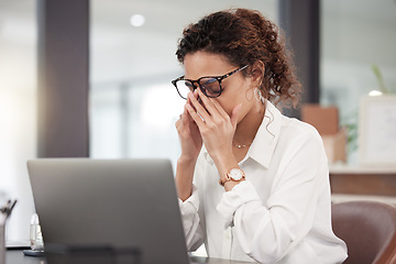 Image showing Business woman, headache and stress in burnout, anxiety or depression on laptop at office. Tired or frustrated female person or employee by computer in fail, mistake or depressed problem at workplace