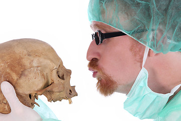 Image showing surgeon with skull