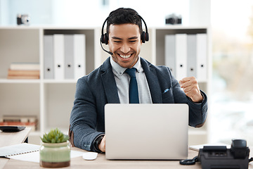 Image showing Business man, fist and telemarketing success with celebration and work promotion email. Male worker, win and good news on a laptop in a office with motivation and typing at call center job with tech