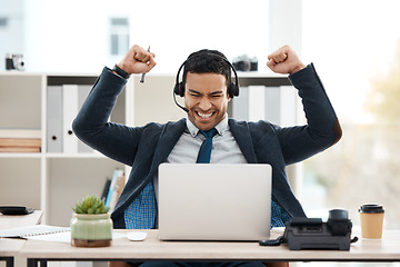 Image showing Business man, telemarketing and success with celebration and work promotion email. Male worker, win and good news on a laptop in a office with motivation and typing at call center job with tech