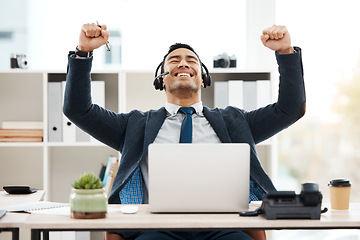 Image showing Business man, success and call center with celebration and work promotion email. Male worker, win and good news on a laptop in a office with motivation and typing at telemarketing job with smile