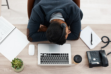 Image showing Sleeping, business man and call center desk from above with fatigue in office. Telemarketing, contact us and phone consultation worker feeling tired and overworked at company with deadline and sleep