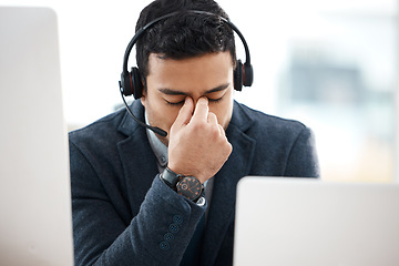 Image showing Headache, call center and business man with fatigue, stress and anxiety in a office with deadline. Contact us, telemarketing and phone consultation work of a worker with eye strain feeling tired