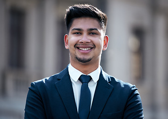 Image showing Lawyer, portrait and business man in city, smile and pride for career or job outdoor in town. Face, happy and confident professional, entrepreneur and male attorney from India with success mindset.