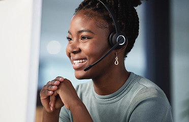 Image showing Call center, customer service and support with a black woman consultant working in her office at night. Contact us, crm and consulting with a happy young female employee at work in telemarketing