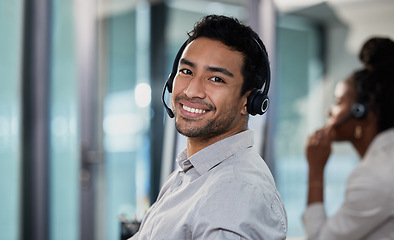 Image showing Portrait, call center and man with telemarketing, customer service and happiness with advice, help or connection. Face, male person or employee with headphones, consultant and agent with tech support