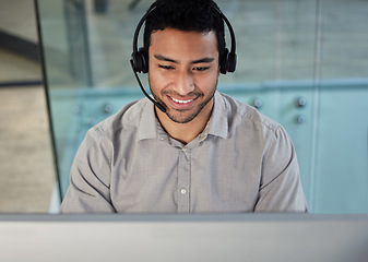 Image showing Call center, customer support and male consultant in the office doing research on crm communication. Headset, technology and telemarketing agent working on an online client consultation in workplace.