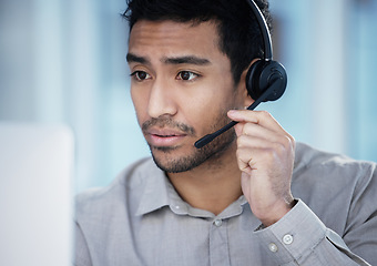 Image showing Listening, call center and business man on computer for telemarketing, customer service and support in office. Crm, contact us and Asian male sales agent, consultant and professional with microphone.