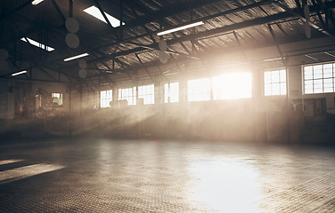 Image showing Gym, interior and empty space or dark room with window and light flare for exercise, training and fitness workout. No people, sports club and floor layout of exercising venue, facility and gymnasium