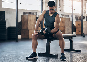 Image showing Man, fitness and training with dumbbell at the gym for strong muscle for sport and power. Male athlete, workout and weight lift for exercise with strength at club with bodybuilder for challenge.